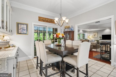 Welcome to this stunning four-sided brick lakefront retreat - photo 10