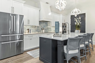 Welcome to one of the few truly custom-built homes in the highly - photo 13