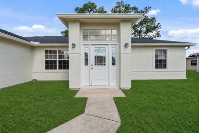 FRESHLY REMODELED Palm Bay home featuring a brand-new roof - photo 2