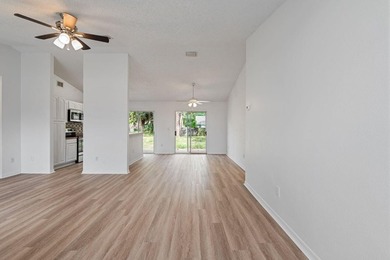 FRESHLY REMODELED Palm Bay home featuring a brand-new roof - photo 5