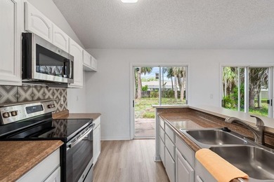 FRESHLY REMODELED Palm Bay home featuring a brand-new roof - photo 10