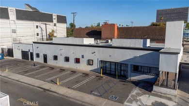 An exceptional and versatile commercial property that presents - photo 1