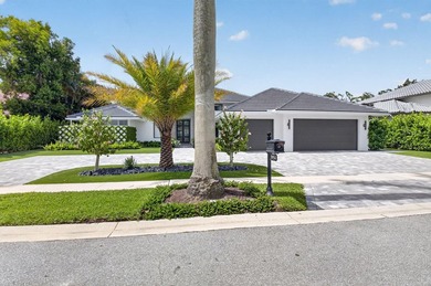 Completely renovated in 2024, this exceptional Woodfield Boca - photo 3