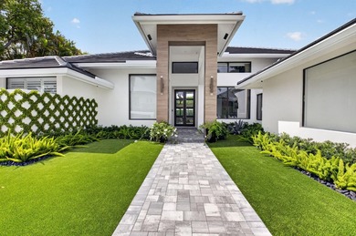 Completely renovated in 2024, this exceptional Woodfield Boca - photo 5