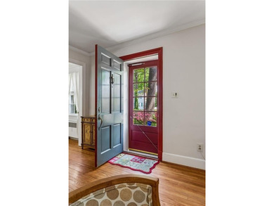 Nestled on a picturesque, wooded lot, this charming Cape Cod is - photo 6
