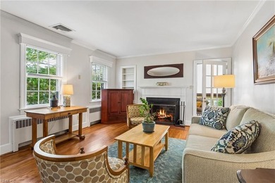 Nestled on a picturesque, wooded lot, this charming Cape Cod is - photo 7