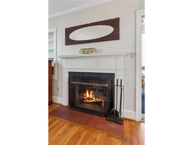 Nestled on a picturesque, wooded lot, this charming Cape Cod is - photo 8