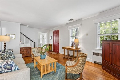 Nestled on a picturesque, wooded lot, this charming Cape Cod is - photo 9