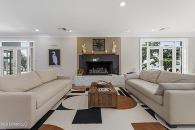 A true Gulf Coast compound - 2.5 private acres fronting both the - photo 3