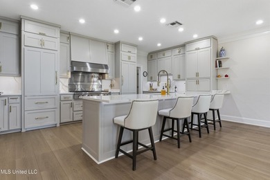 A true Gulf Coast compound - 2.5 private acres fronting both the - photo 6