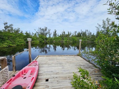 Lake Home For Sale in Bokeelia, Florida