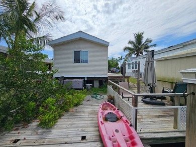 This home is situated directly on the water! Amazing location - photo 8