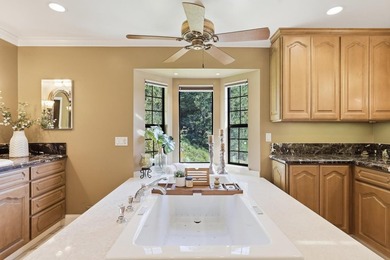 Welcome to 18803 Hilltop Way, a private gated estate nestled in - photo 18