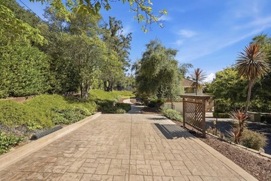 Welcome to 18803 Hilltop Way, a private gated estate nestled in - photo 42