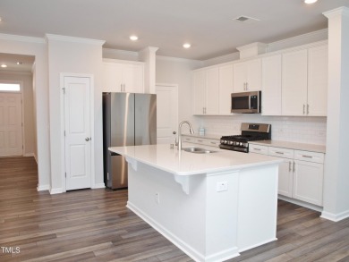 Don't miss this amazing END UNIT townhome! This one is as close