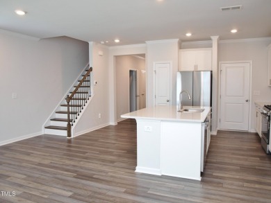 Don't miss this amazing END UNIT townhome! This one is as close