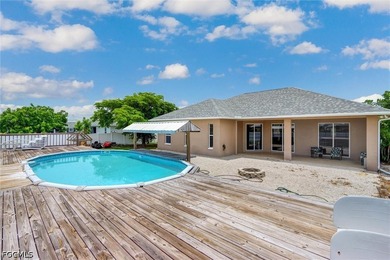 Solidly built 1998 concrete-block home on a rare three-lot - photo 2