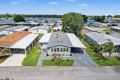 OWN YOUR OWN LAND IN THIS SOUGHT-AFTER RESORT-STYLE 55+ GATED - photo 2
