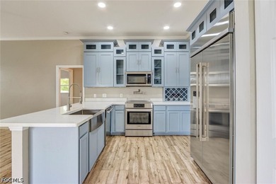 Solidly built 1998 concrete-block home on a rare three-lot - photo 4