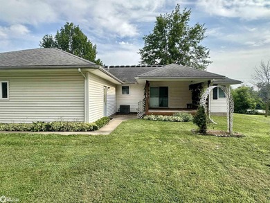 This well-maintained ranch-style home offers a spacious floor