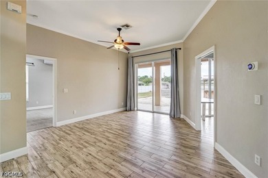 Solidly built 1998 concrete-block home on a rare three-lot - photo 10