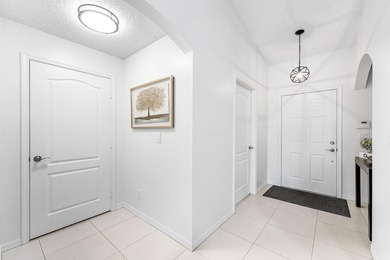 This beautifully updated lakefront villa blends timeless comfort - photo 11
