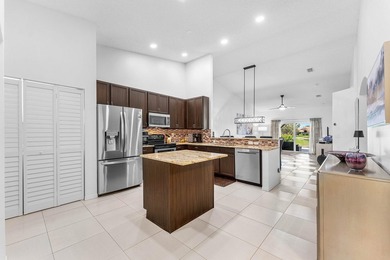 This beautifully updated lakefront villa blends timeless comfort - photo 13
