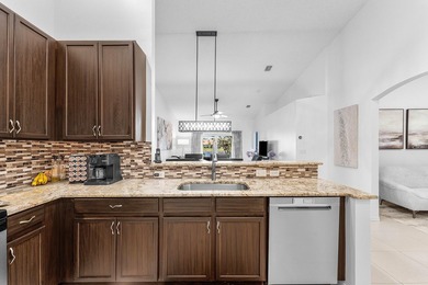 This beautifully updated lakefront villa blends timeless comfort - photo 16