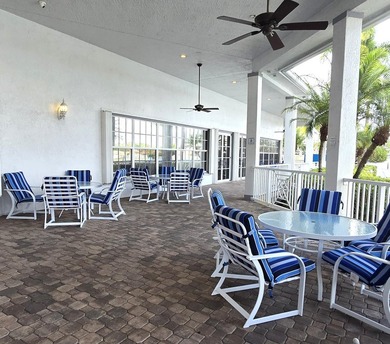 This beautifully updated lakefront villa blends timeless comfort - photo 42