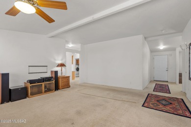 Nestled on over four acres of peaceful desert landscape, this