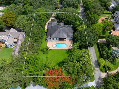 Set on a prime corner lot spanning 33,976 SF in one of - photo 1