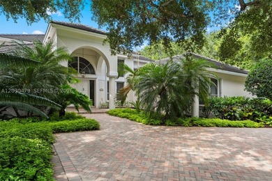 Set on a prime corner lot spanning 33,976 SF in one of - photo 3