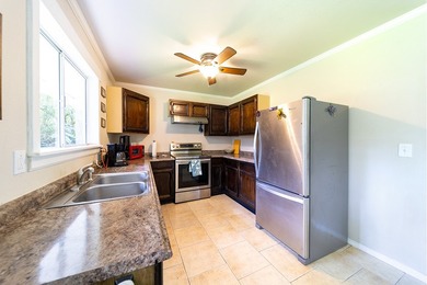 Welcome to this fully furnished 3-bedroom, 2-bath home tucked - photo 7