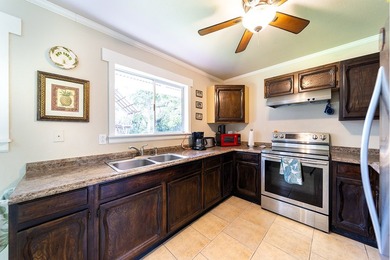 Welcome to this fully furnished 3-bedroom, 2-bath home tucked - photo 8