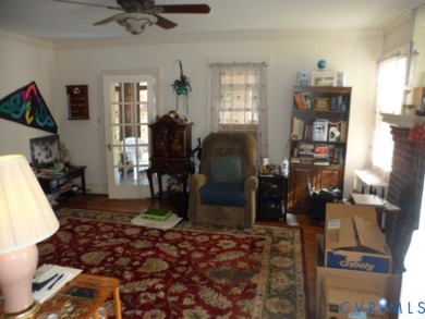 Welcome home to this brick cape cod with a slate roof in the