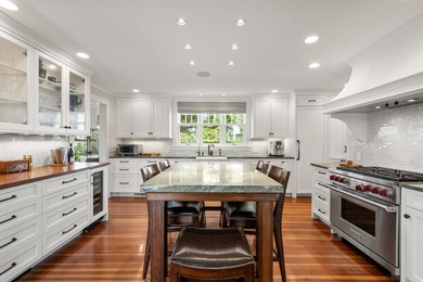Presenting an offering of rare distinction. Refined coastal - photo 15