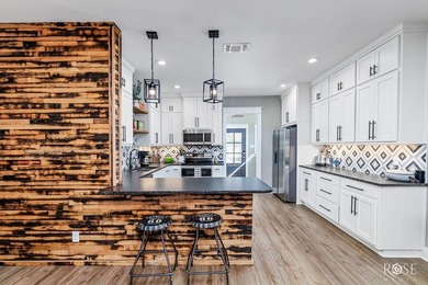This 3-year-old, modern-construction home is ideally situated on - photo 6