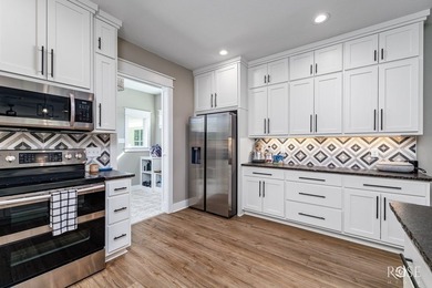 This 3-year-old, modern-construction home is ideally situated on - photo 7