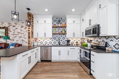 This 3-year-old, modern-construction home is ideally situated on - photo 8