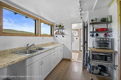 Set in the heart of the Roaring Fork Valley, this extraordinary - photo 27
