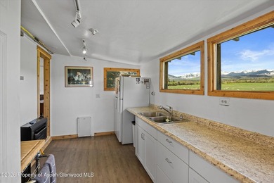 Set in the heart of the Roaring Fork Valley, this extraordinary - photo 28