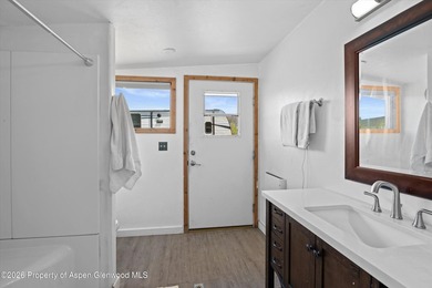 Set in the heart of the Roaring Fork Valley, this extraordinary - photo 30