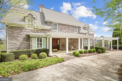 Located in the exclusive gated community of Lake Rabun Bluffs in - photo 3