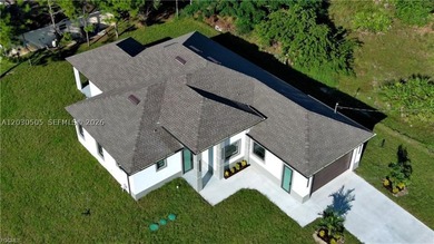 Discover this beautifully designed 5-bedroom, 4-bathroom corner - photo 3