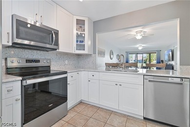 Welcome to this beautifully updated, FIRST FLOOR condominium in - photo 4