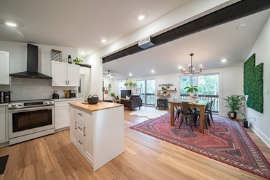 Nestled on a beautiful creek bank with water access to the - photo 4