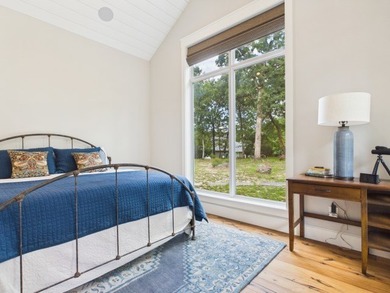 Nestled among towering hardwoods in the gated waterfront - photo 33