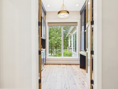Nestled among towering hardwoods in the gated waterfront - photo 42