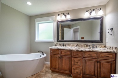 Welcome home to this beautiful ranch nestled in the highly - photo 37