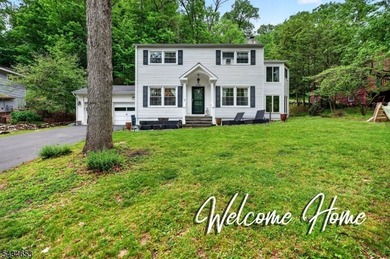 GORGEOUS inside and out! Spectacular views of Lake Mohawk from - photo 1